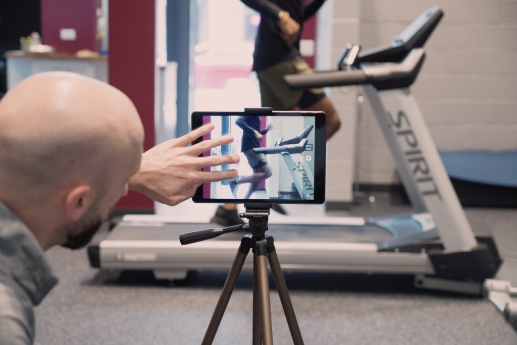 Athlete undergoing gait assessment on treadmill